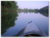 Early morning and all you hear is a gurgle of the water under the bow as it slices through the mirror surface.